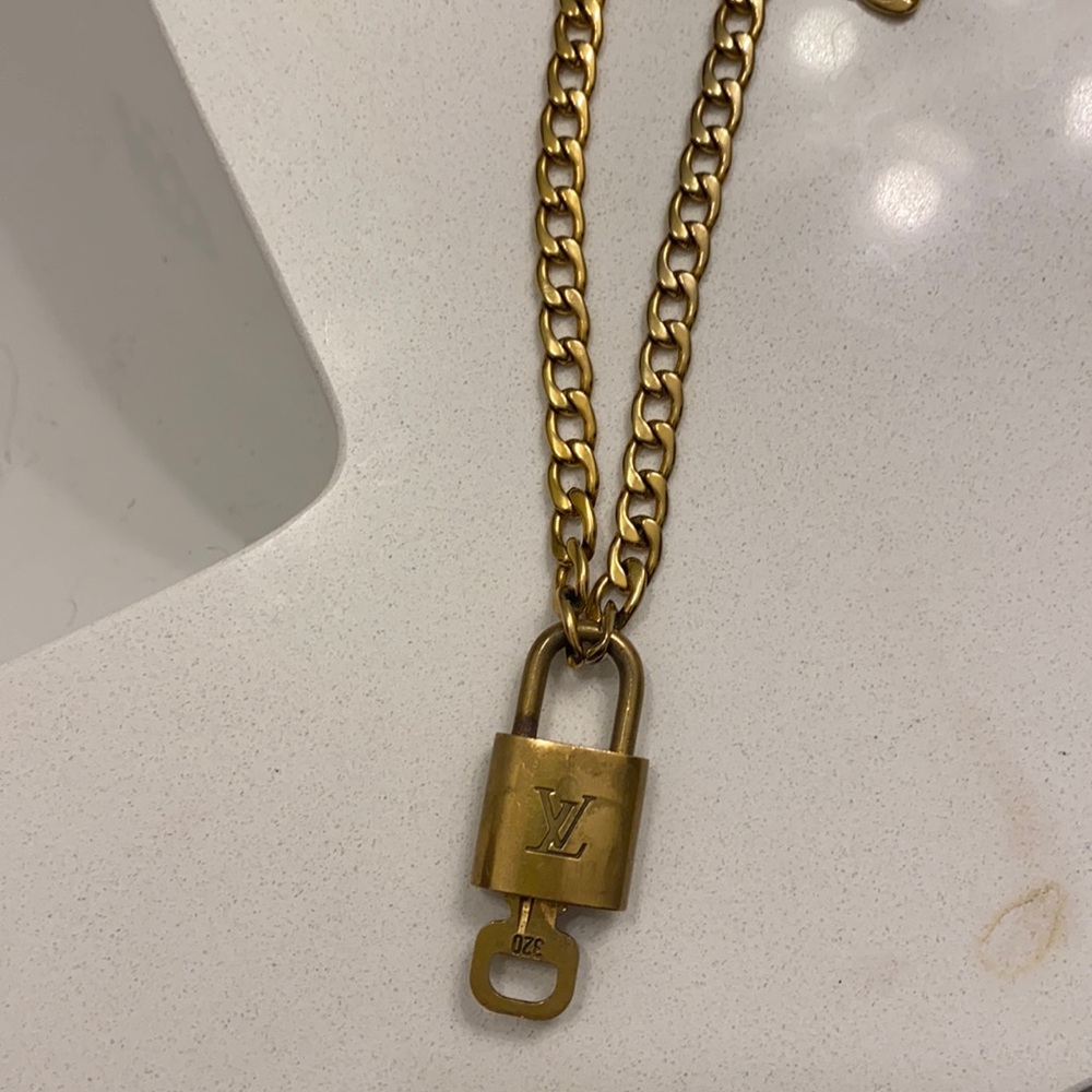 Louis Vuitton Lock and key with gold necklace